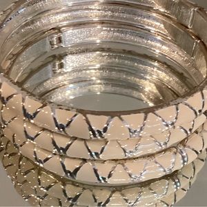 Stack of three on trend bracelets